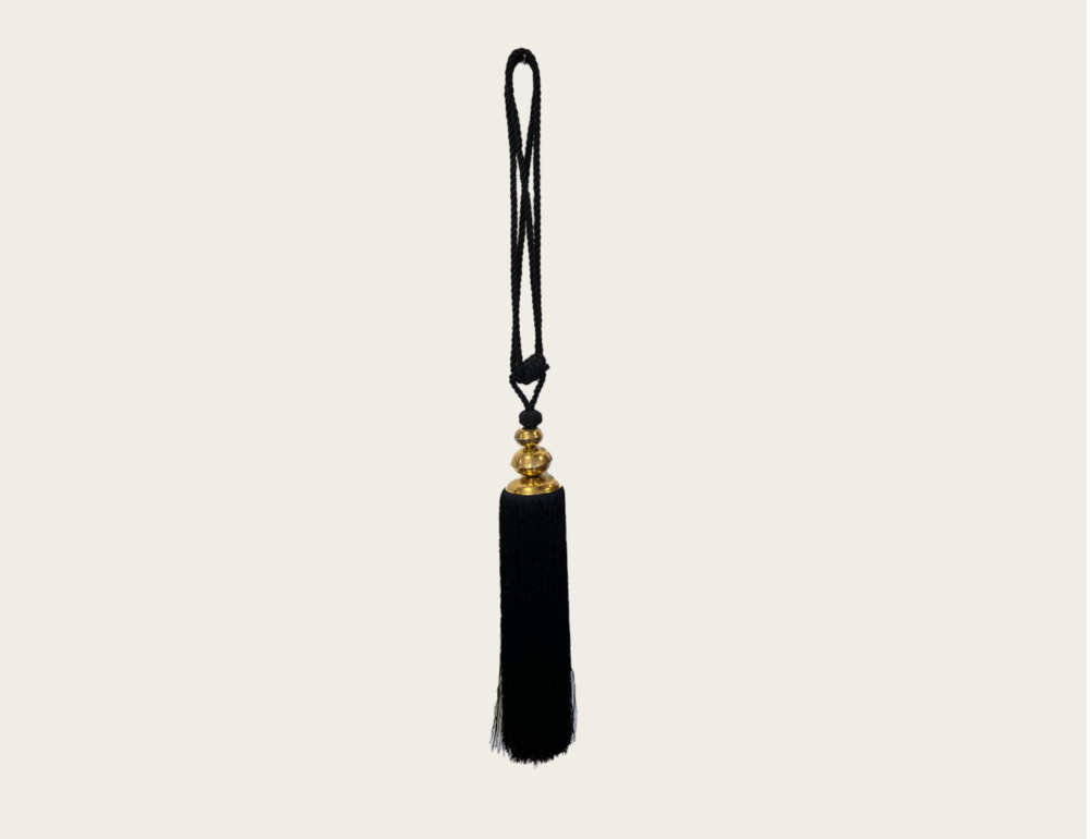 Pompon embrasse noir et or décoration intérieur rideaux